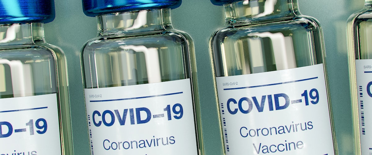 COVID-19 vaccine vials — NHS COVID-19 vaccination at Barons Court Pharmacy